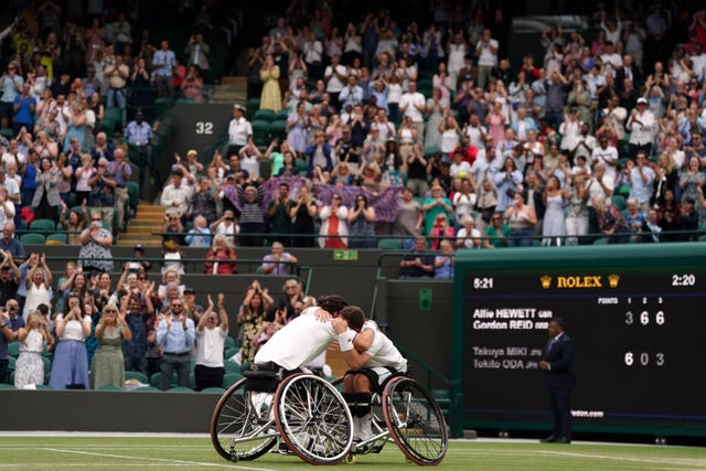 Alfie Hewett and Gordon Reid celebrate victory on a packed Court One