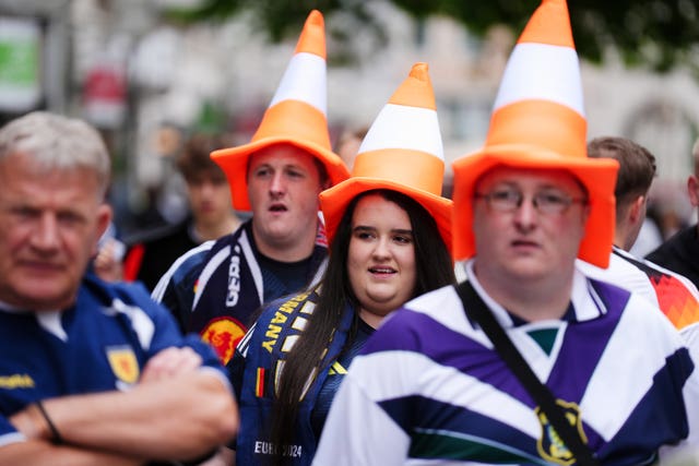 Scotland fans wear hats resembling traffic cones