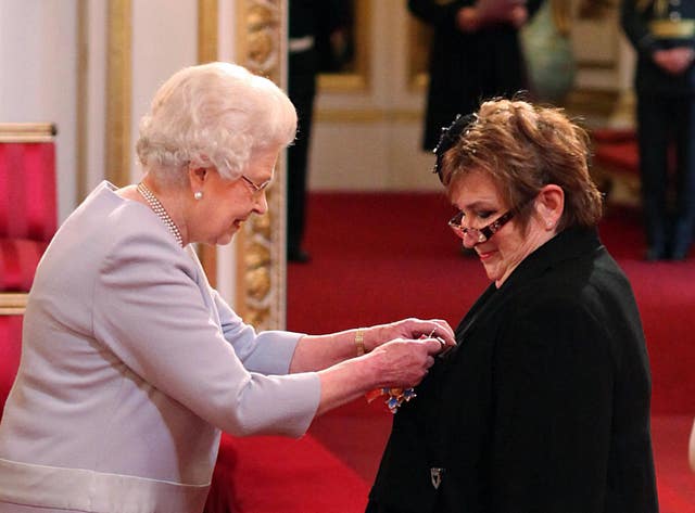 Dame Jenni Murray is made a Dame Commander by the Queen during an Investiture ceremony at Buckingham Palace in 2011