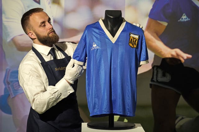 Sale of Maradona's 'Hand of God' shirt sets sports memorabilia auction  record