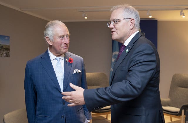 The Prince of Wales greets the Prime Minister of Australia Scott Morrison