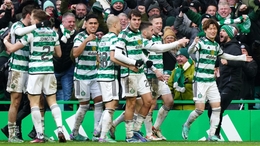 Celtic’s Kyogo Furuhashi, right, celebrates with team-mates after scoring what proved to be their Old Firm derby winner (Jane Barlow/PA)