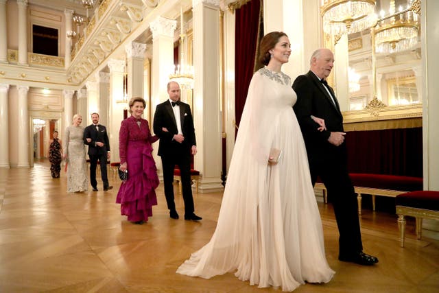 The Duchess of Cambridge is escorted into dinner by King Harald V of Norway and the Duke of Cambridge is escorted by Queen Sonja of Norway at the Royal Palace in Oslo (Chris Jackson/PA)