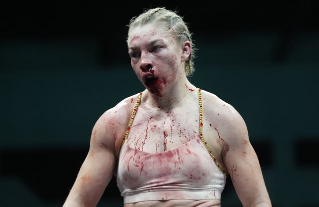Lauren Price bleeding during her welterweight title bout against Stephanie Pineiro 