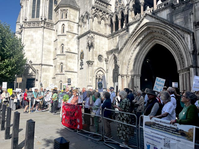 Dozens of campaigners demonstrated outside the Royal Courts of Justice before the hearing (Callum Parke/PA)