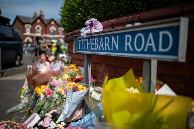 Flowers and tributes near the scene in Hart Street, Southport 