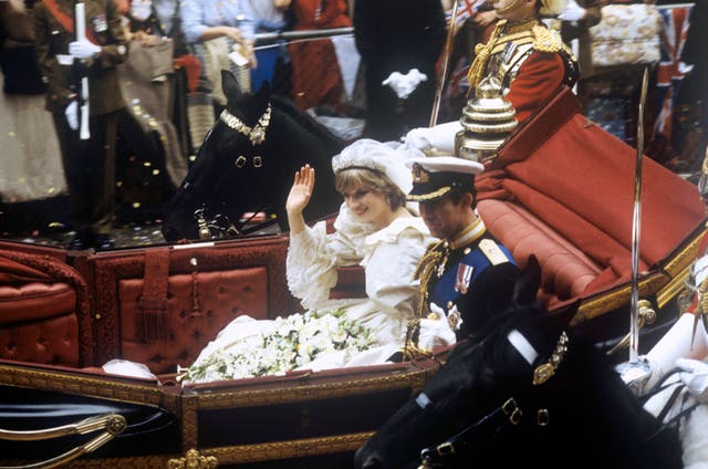 The Prince and Princess of Wales in a carriage after their wedding at St Paul's Cathedral.