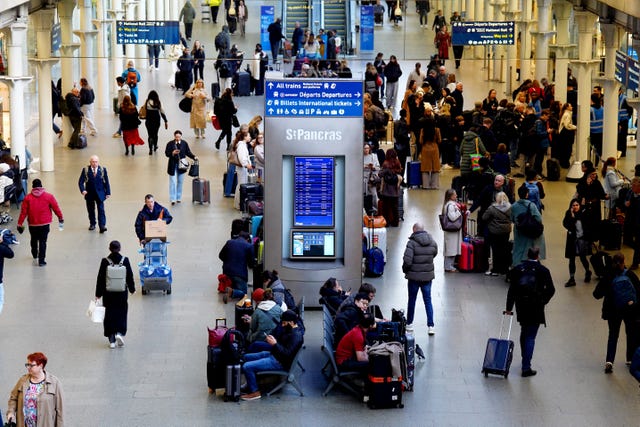 Passengers at St Pancras International station in London after Eurostar trains to the capital were halted following the discovery of an unexploded Second World War bomb near the tracks in Paris