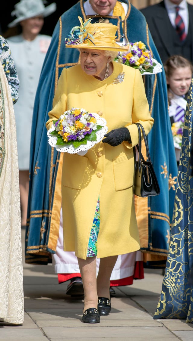 The Queen leaving St George’s Chapel in Windsor after the annual Royal Maundy Service 
