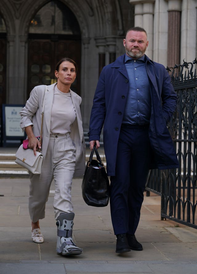 Coleen and Wayne Rooney at the Royal Courts of Justice