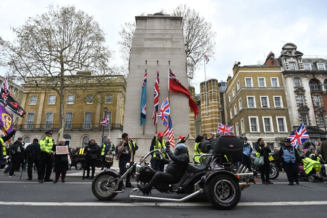 Motorcyclists ride past the Cenotaph