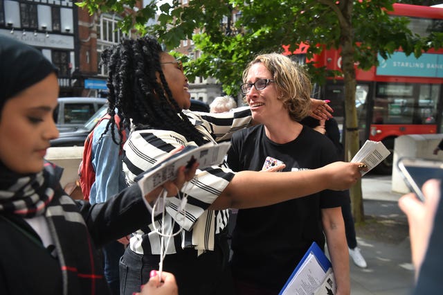 Protesters celebrate outside the court