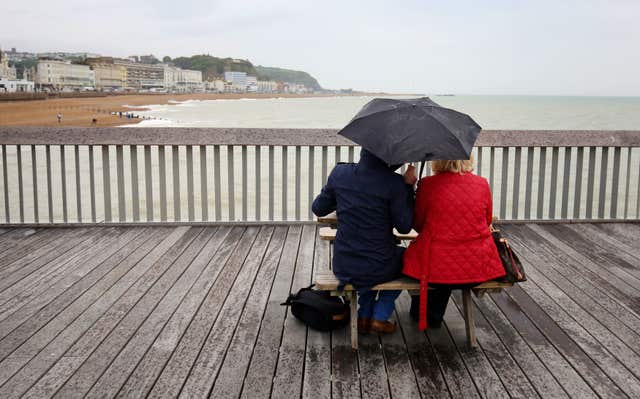 A couple on Hastings Pier
