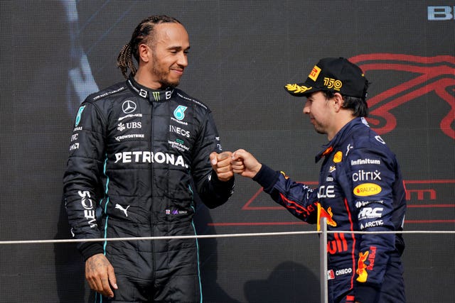 Lewis Hamilton of Mercedes (left) with second place Sergio Perez of Red Bull at the British Grand Prix