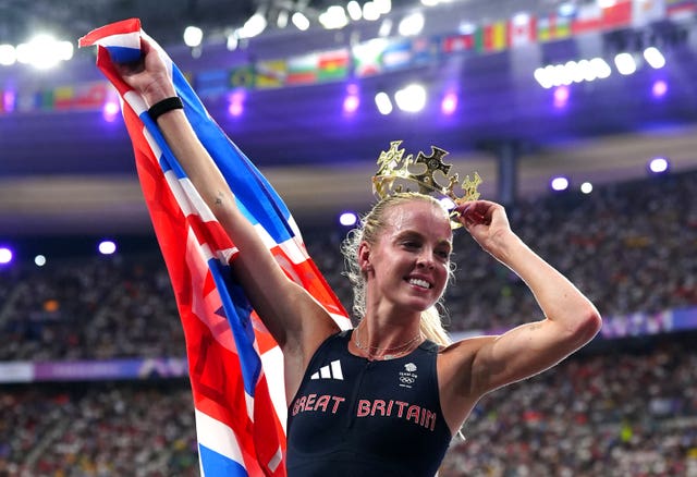 Keely Hodgkinson celebrates winning the 800 metres at the Paris Olympics