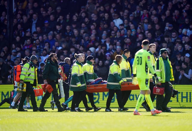 Crystal Palace’s Jean-Philippe Mateta is carried off on a stretcher during the FA Cup fifth round match against Millwall