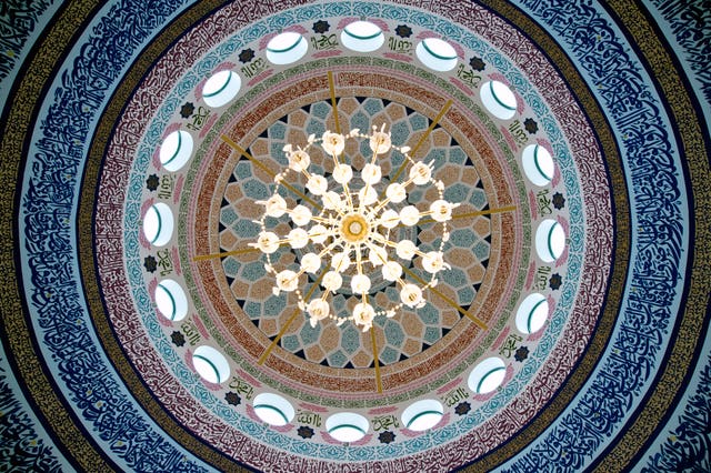 The interior of the dome of a mosque (Oli Scarff/AP)