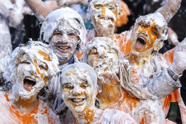 Students taking part in the traditional Raisin Monday foam fight