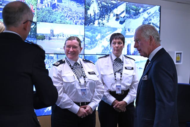 King Charles III (right) speaks to Deputy Assistant Commissioner Jane Connors (second right), Commander Karen Findlay (second left) and Commissioner Mark Rowley (left) during a visit to the Metropolitan Police Service Special Operations Room