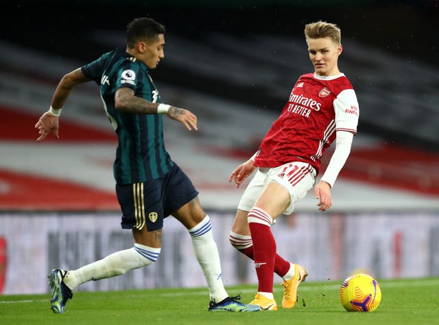 Martin Odegaard, right, made his full Arsenal debut