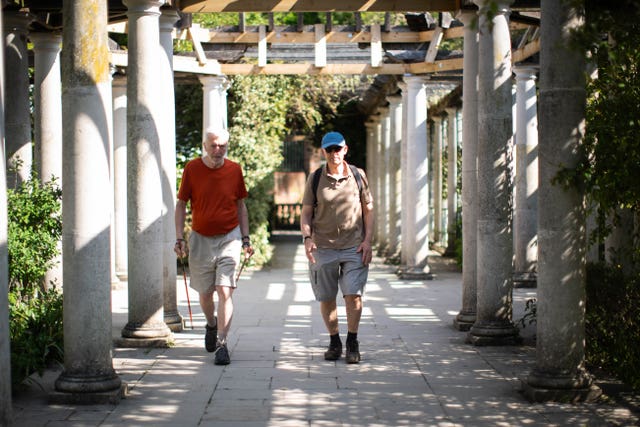 People walk through the Hill Garden and Pergola near Hampstead in north London