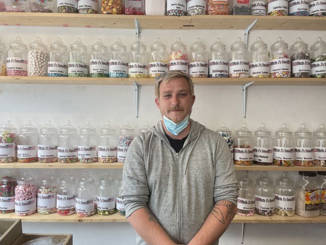 Clinton Matthews, owner of J's Sweets, inside his shop in St Ives during the G7 summit in Cornwall 