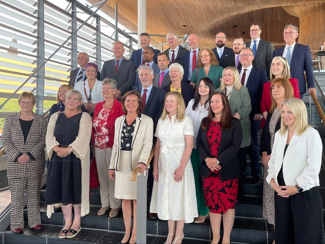 First Minister of Wales Eluned Morgan (third from left, bottom row) with all the members of the Senedd Labour group at the Senedd in Cardiff, after being elected as the first female leader of Wales following the resignation of Vaughan Gething