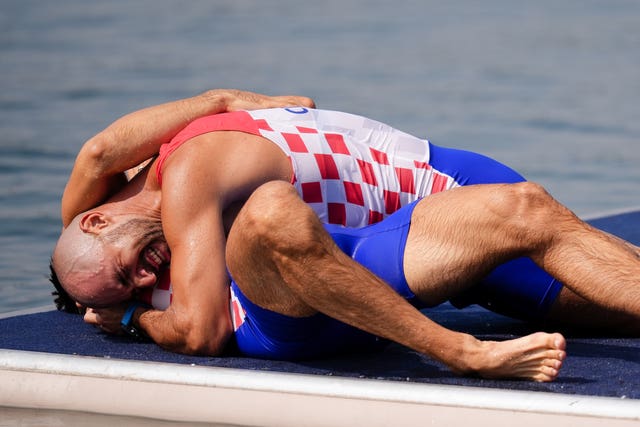 Croatia’s Martin Sinkovic and Valent Sinkovic celebrate in their boat