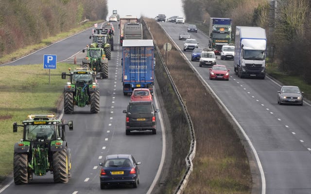 Farmers in tractors making their way along the A303 near Andover