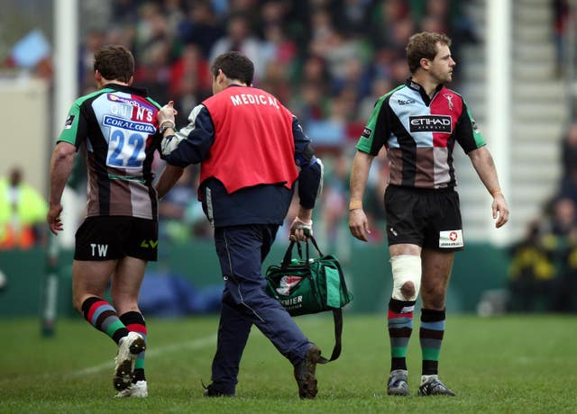 Harlequins Tom Williams, left, is blood replaced by Nick Evans in the last few minutes of the Heineken Cup match at Twickenham Stoop against Leinster