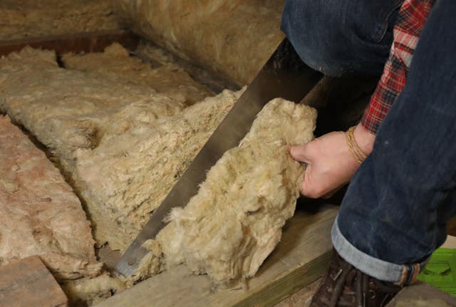 Loft insulation being installed