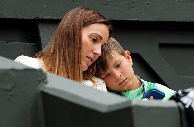 Jelena and Stefan Djokovic during the lengthy delay