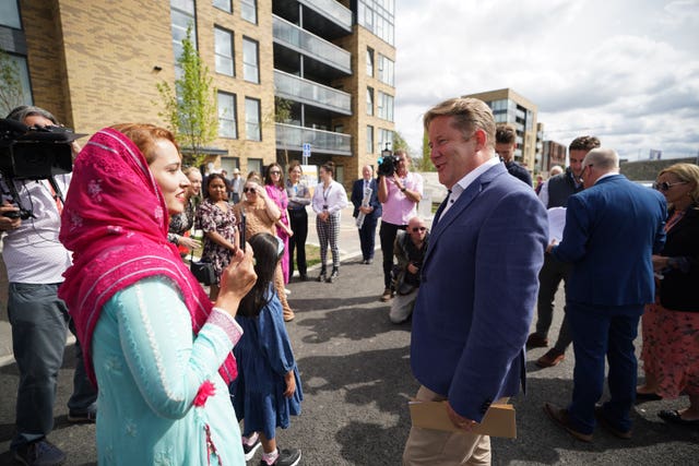 Housing Minister Darragh O’Brien speaks with Haleema Sadia during the official opening of 118 new cost rental homes in west Dublin