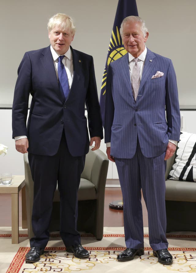 Prime Minister Boris Johnson and the Prince of Wales meet over morning tea