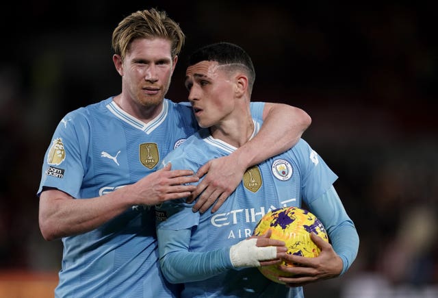 Phil Foden, right, took the match ball