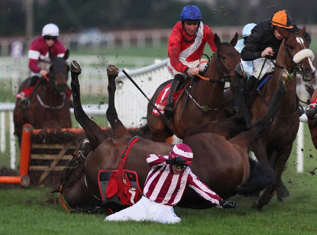 Bryan Cooper is unseated by Coeur Sublime at the last fence of the Knight Frank Juvenile Hurdle at Leopardstown