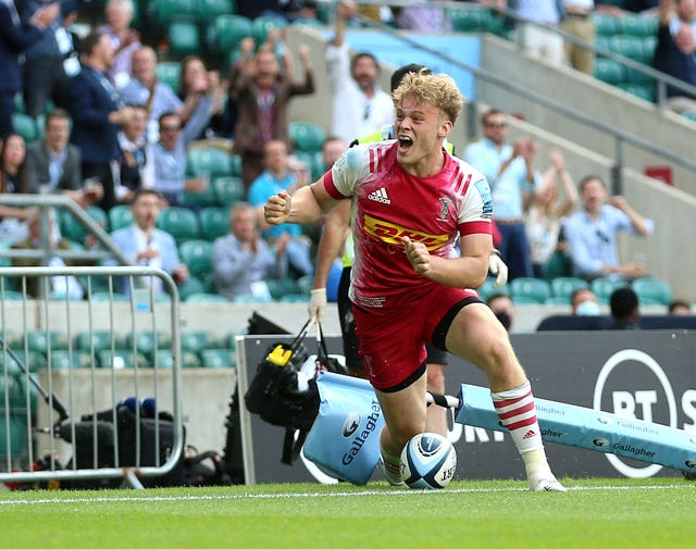 Louis Lynagh scored two late tries to seal Harlequins' first league title in nine years