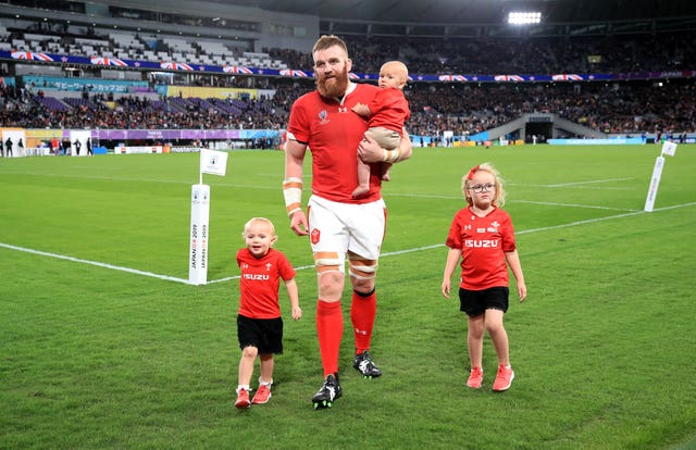 Jake Ball with his children after a game