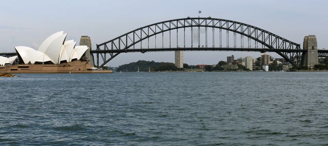 A view of the Sydney Harbour Bridge and Opera House (Chris Radburn/PA)