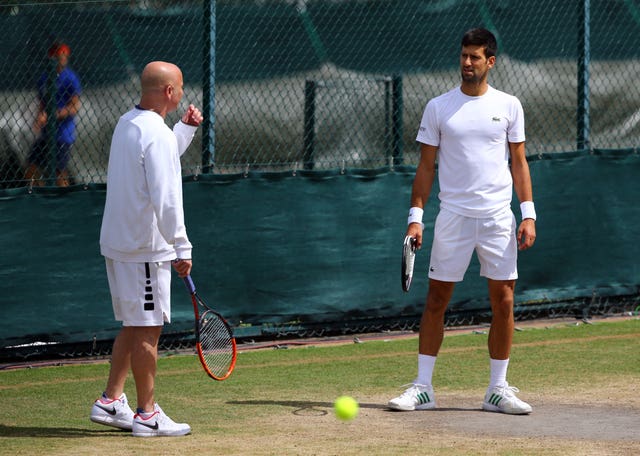 Novak Djokovic during a training session with coach Andre Agassi on day nine of the Wimbledon Championships 2017 (Gareth Fuller/PA)