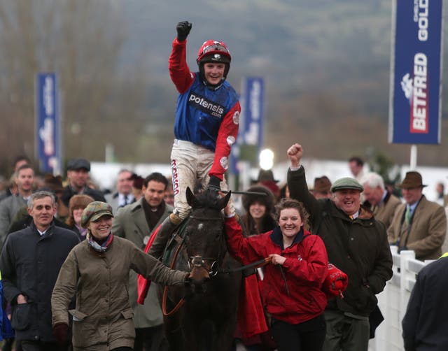 Harry Derham celebrates winning the Martin Pipe Conditional Jockeys’ Handicap Hurdle on Salubrious at the Cheltenham Festival in 2013