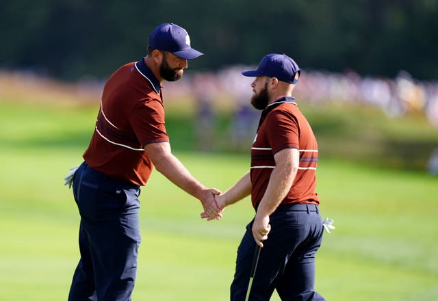 Jon Rahm and Tyrrell Hatton on the course