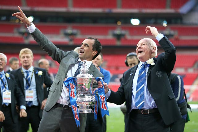 Wigan chairman Dave Whelan, right, savours the moment after his club's Wembley triumph 