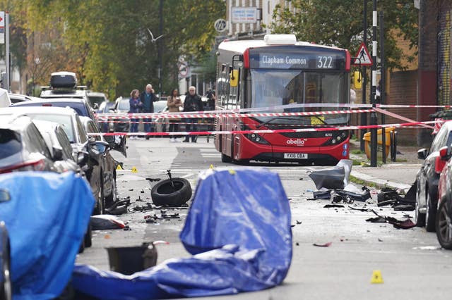 The scene in Railton Road, Brixton, where debris was left scattered in the road.