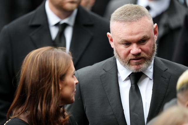Wayne Rooney and his wife Coleen arrive at Manchester Cathedral 