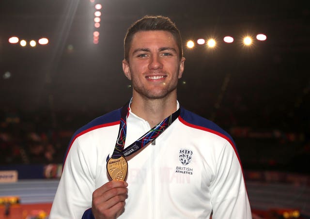 Andrew Pozzi with his gold medal from the 2018 Indoor World Championships