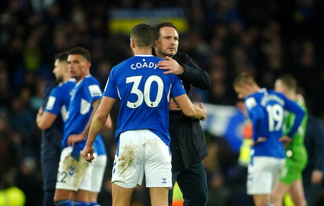 Everton manager Frank Lampard, right, consoles Conor Coady 