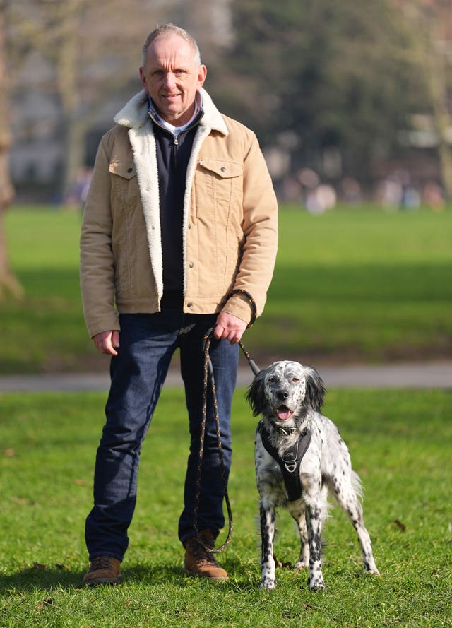 Nick Johnson, 63, from Wiltshire, with Louis, a six-year-old English setter, during a launch event for Crufts 2025 in Green Park, London