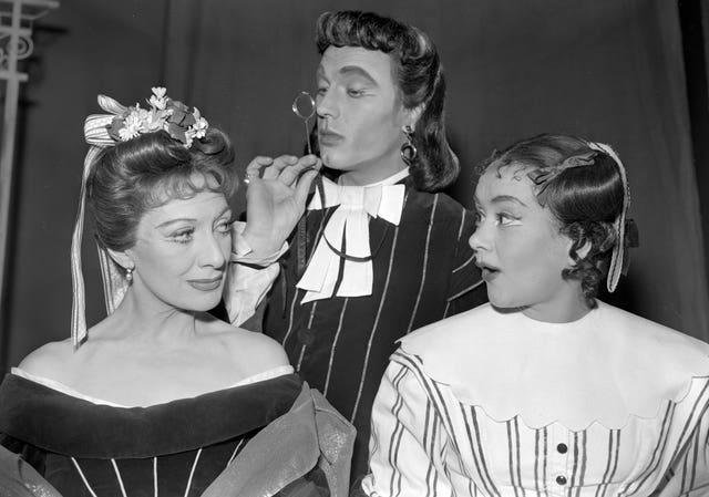 Dame Joan (right), Diana Churchill and Laurence Harvey in costume for the restoration comedy The Country Wife