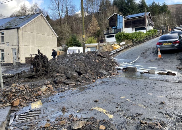 Debris on a street in Cwmtillery, Wales, where a mudslide forced residents from their homes